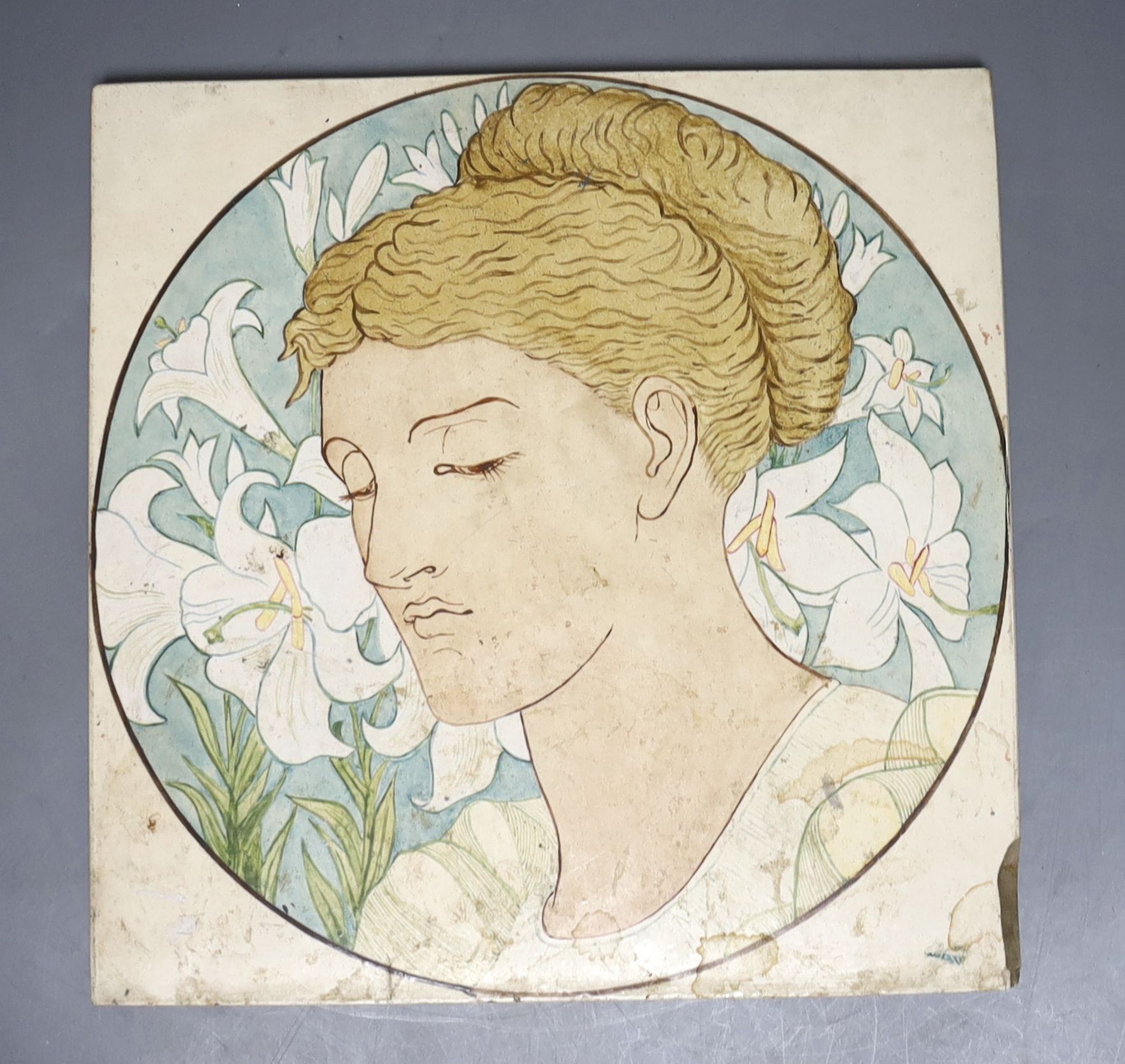 A large Victorian Minton tile, painted with a female portrait roundel, signed verso A. Speakman, 23cm
